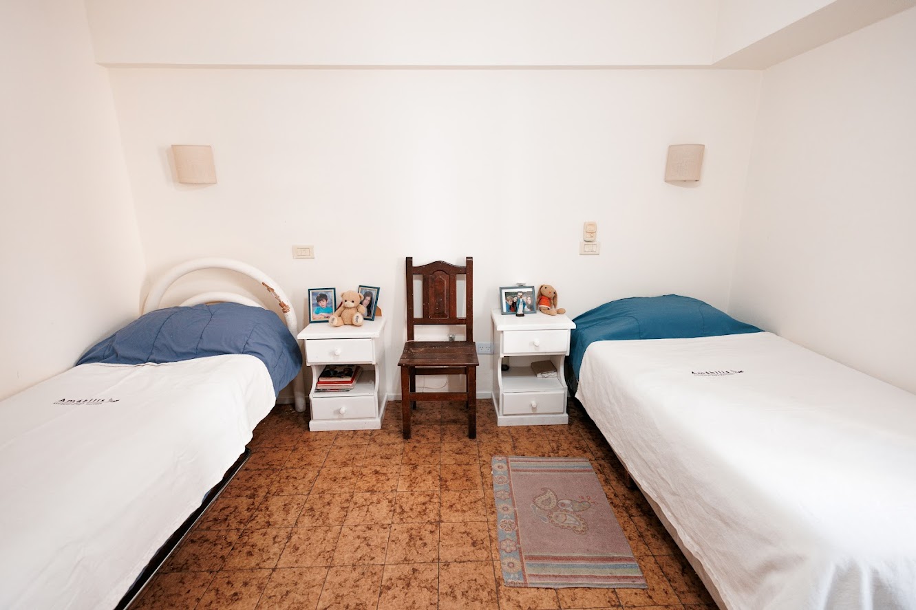 Interior de habitación doble en residencia Amábilis